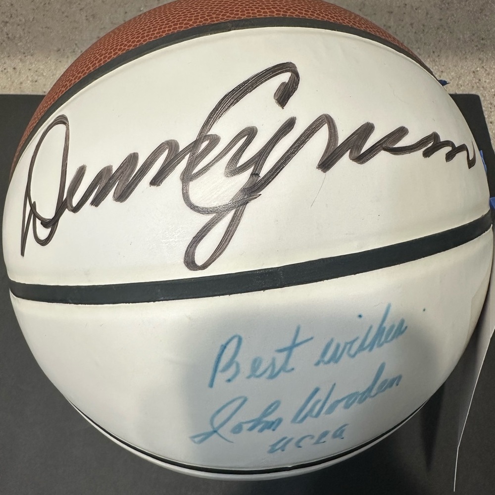 Basketball signed by Denny Crum and John Wooden (JSA Authenticated)